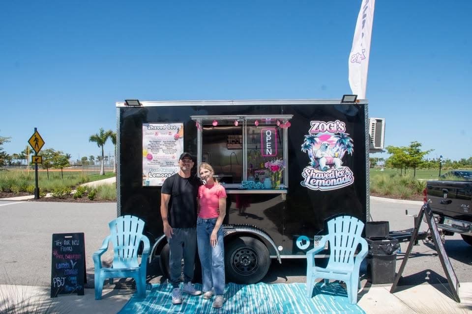 Matt & Danielle in front of the Zogi's food truck